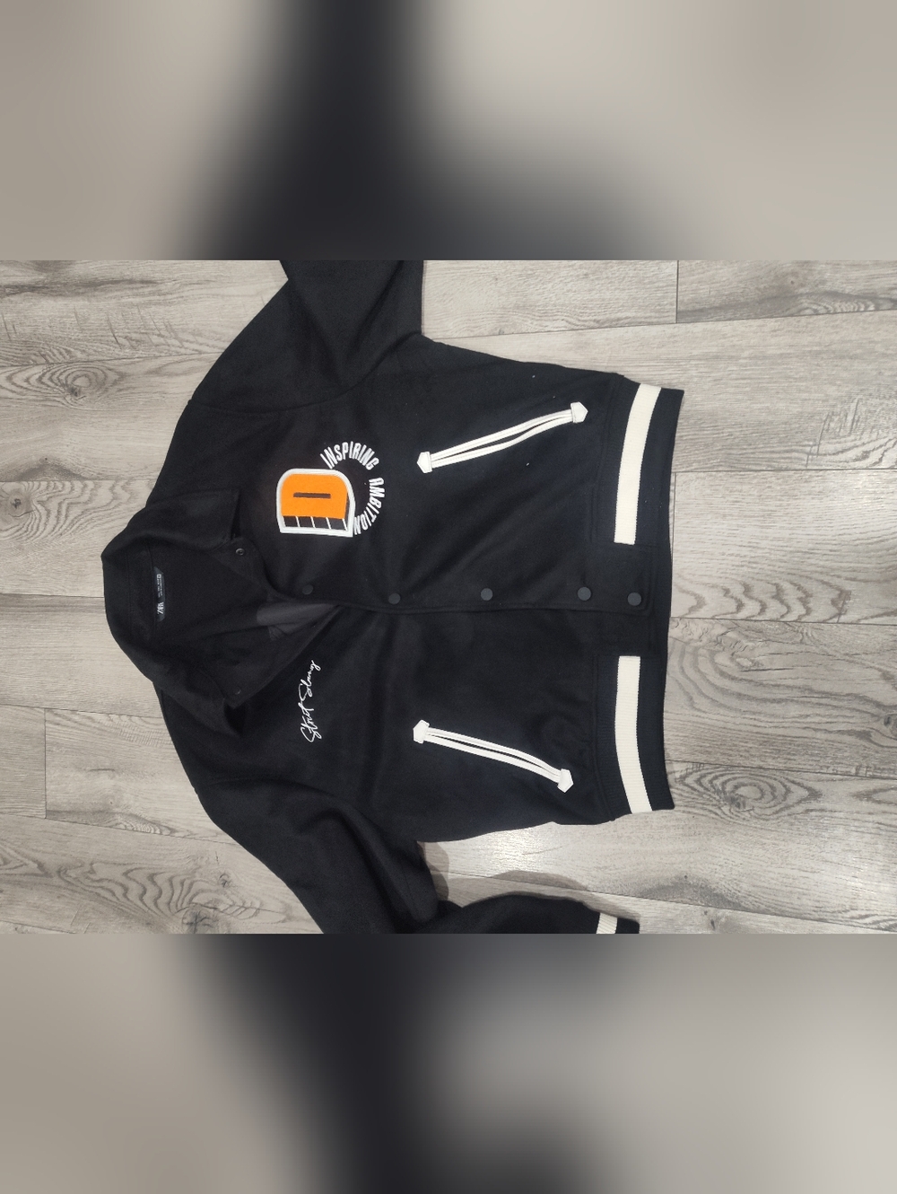 Zara Black Varsity Jacket with White Trim and Orange Emblem